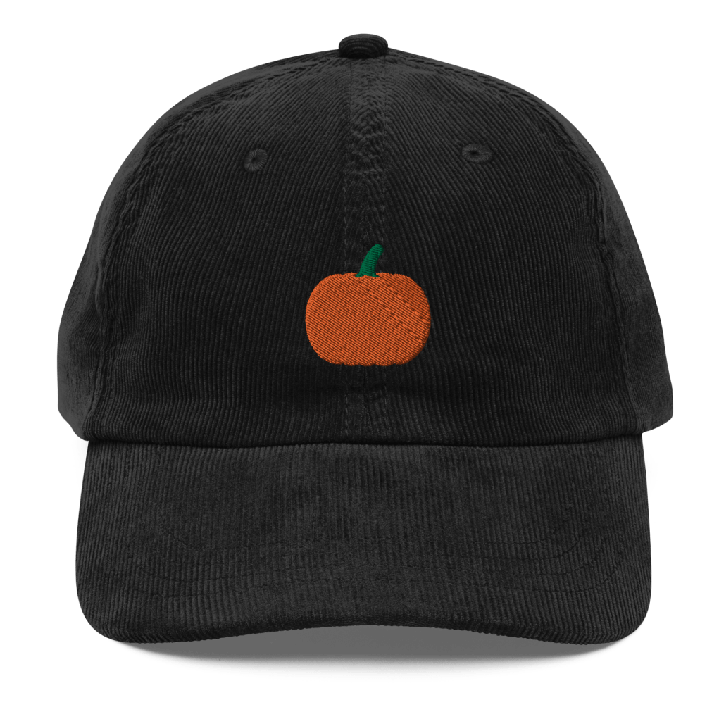 Black corduroy dad hat with an embroidered orange pumpkin on the front panel