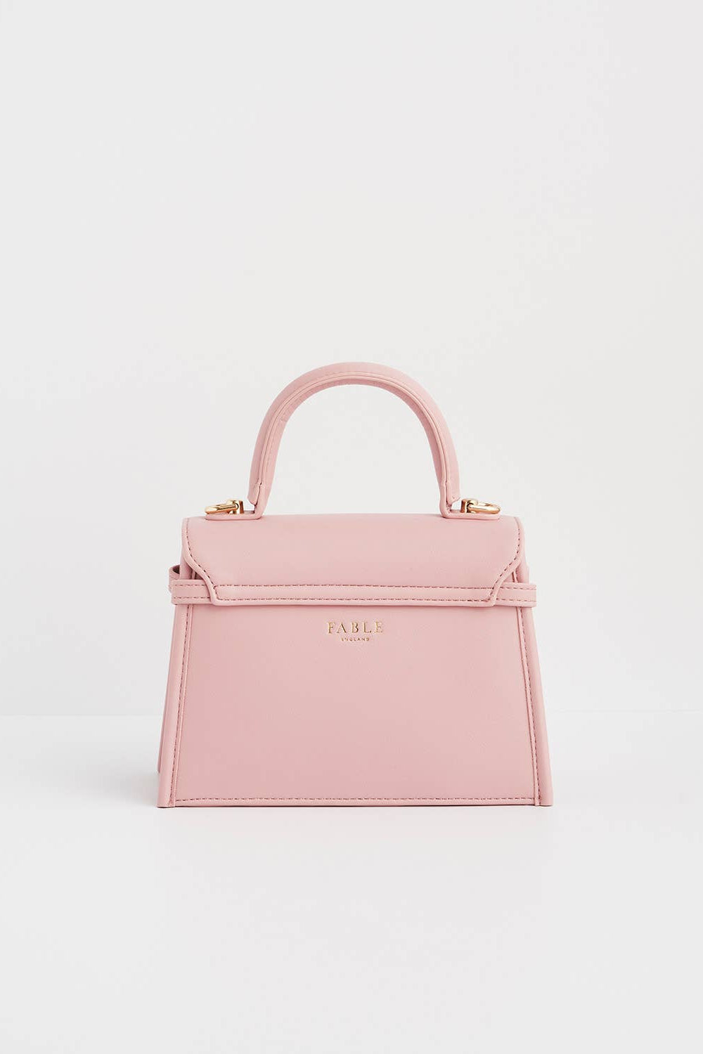 Pink handbag on a light gray background