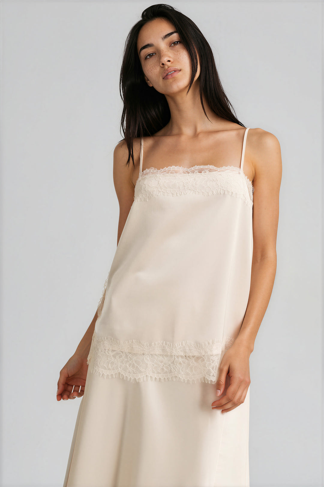 Off white satin camisole with a square neckline and scalloped lace trim, front view