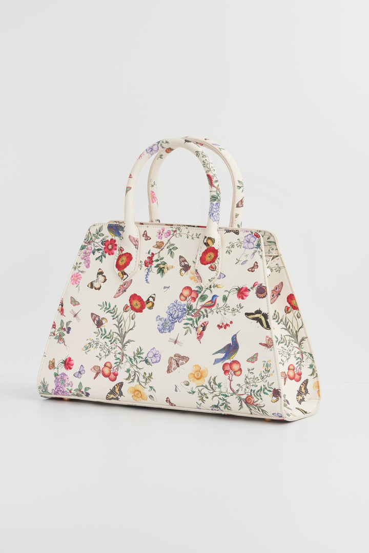 Floral patterned handbag on a light gray background