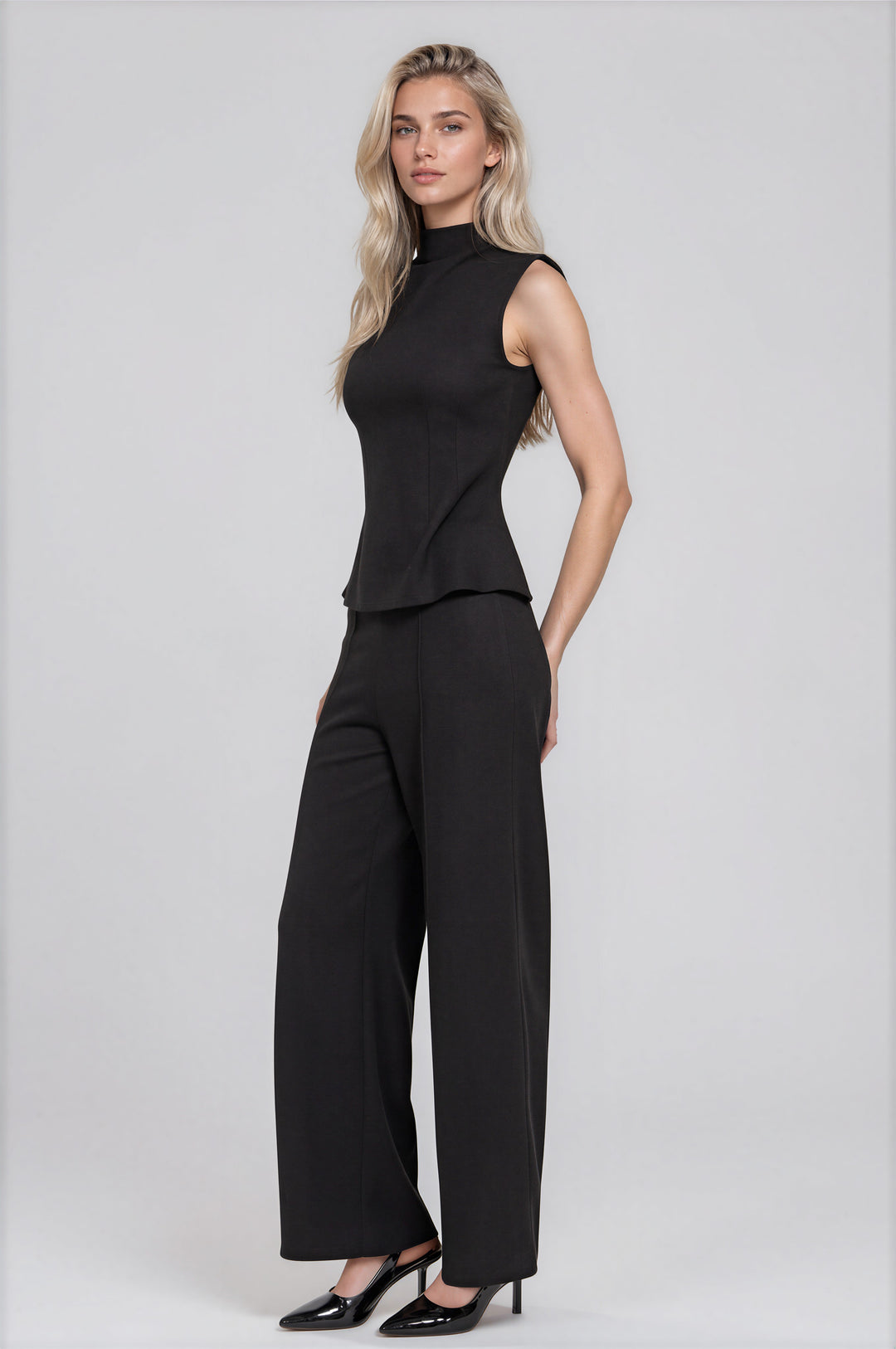 Black sleeveless high-neck brushed rib top with matching straight-leg pants