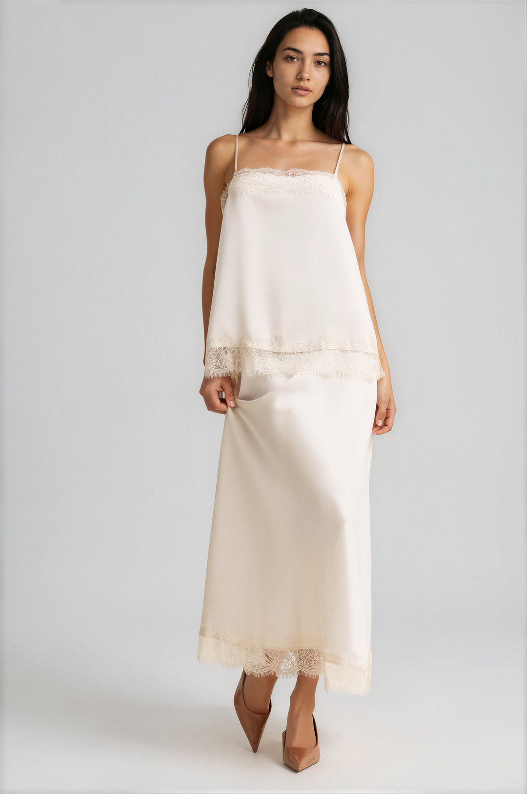 Cream satin slip skirt with scalloped openwork lace at the hem, front view