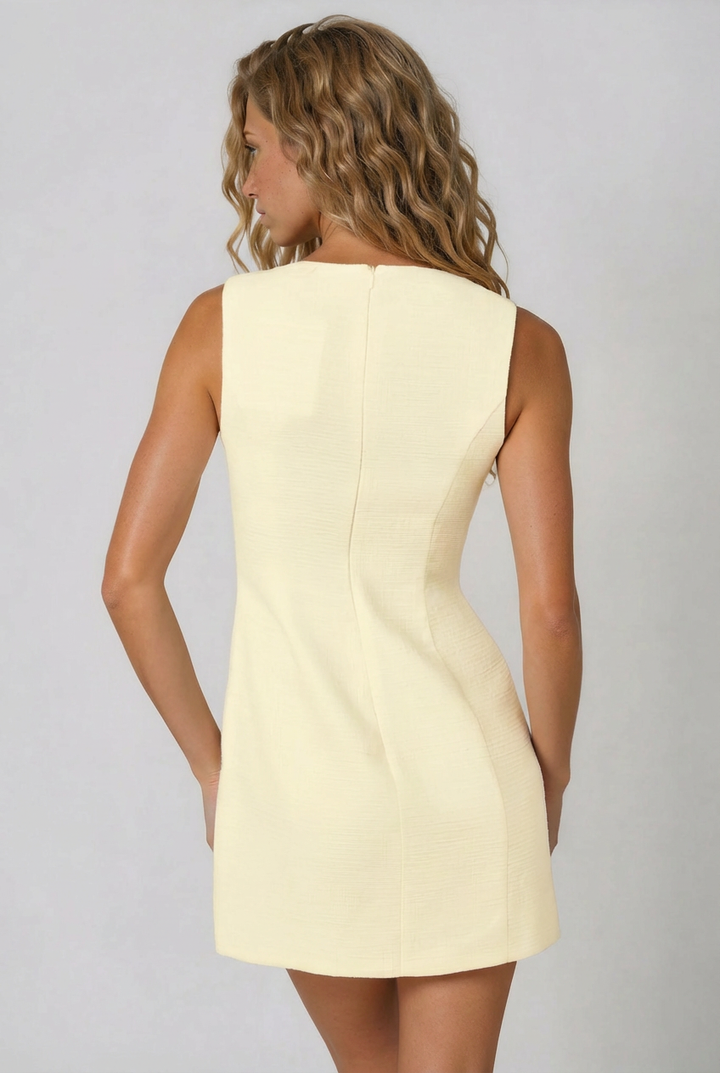 pale yellow mini dress for summer back view