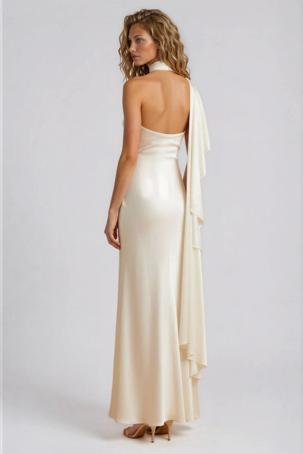 white draped one shoulder maxi gown