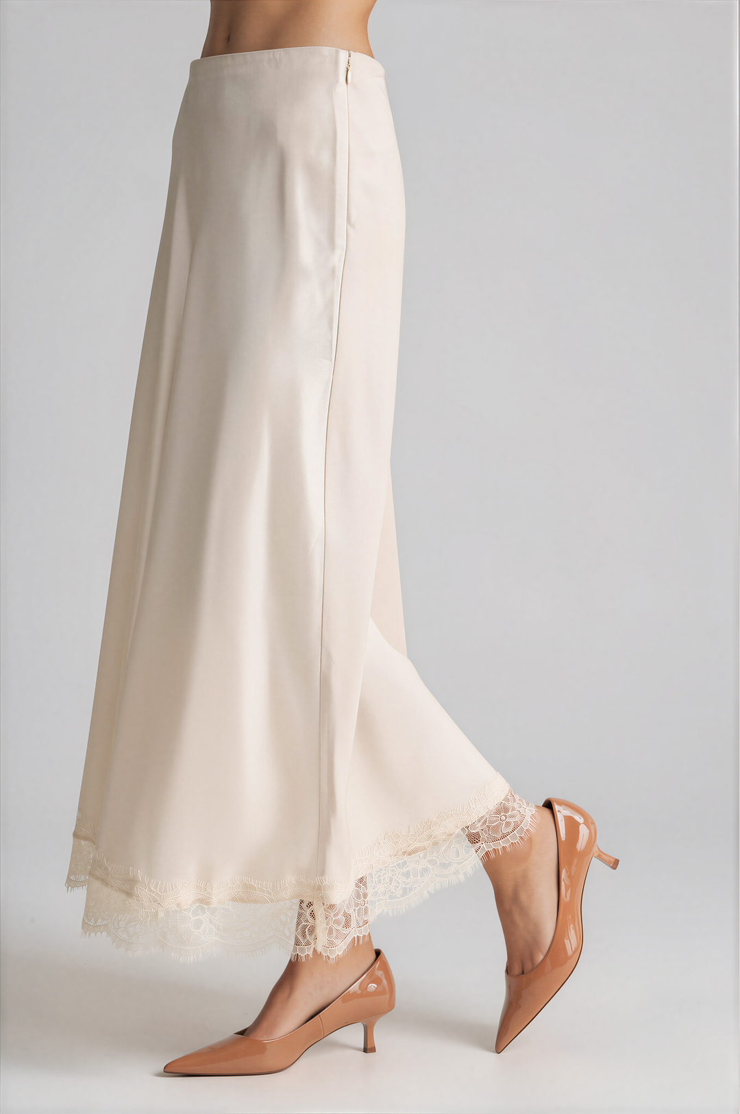 Cream satin slip skirt with a lace hem, back view