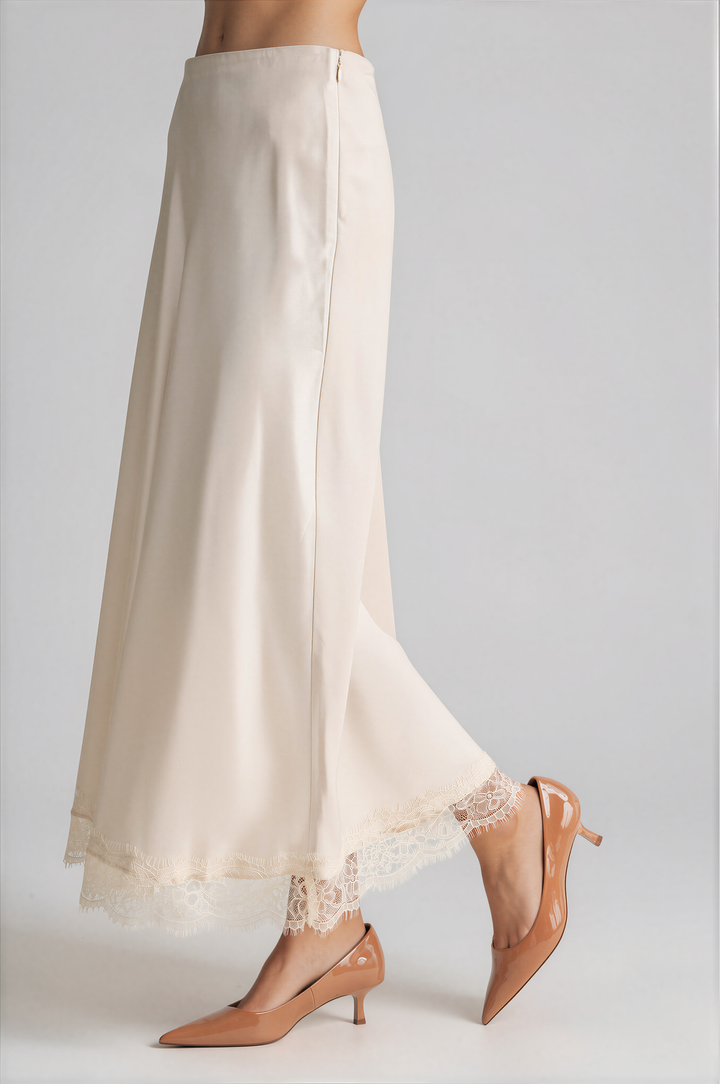 Cream satin slip skirt with a lace hem, back view
