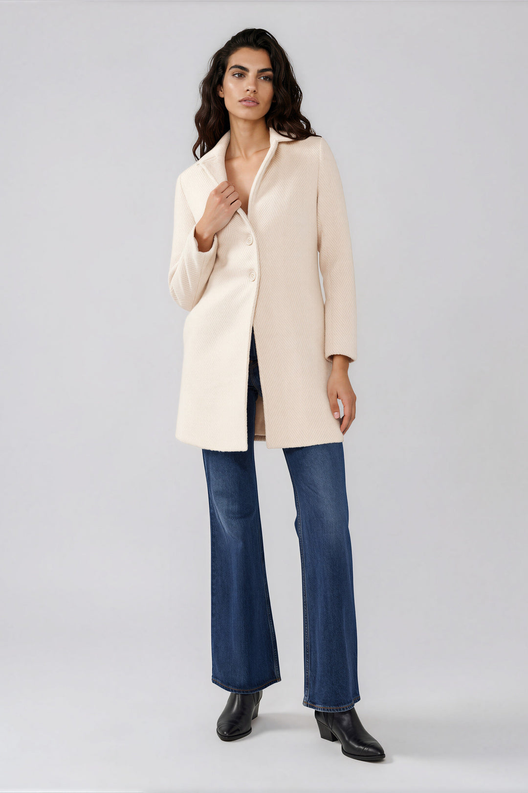 Cream chevron coat with long sleeves and side pockets