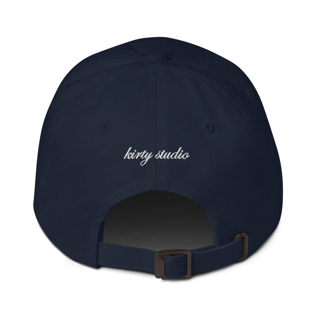 Navy blue cap with 'extra dirty extra olives' text on a white background