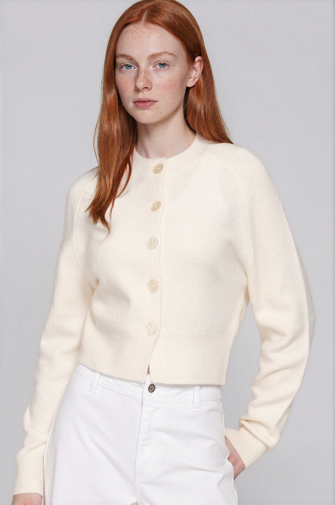 Ivory round-neck button-down knit cardigan, front view