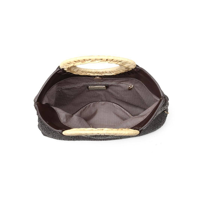 Black handbag with gold handles on a white background