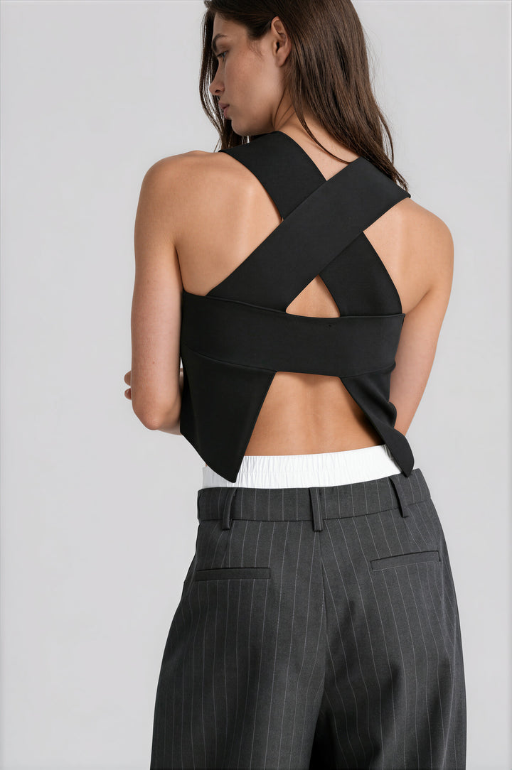 black sleeveless cropped top with intricate back detailing