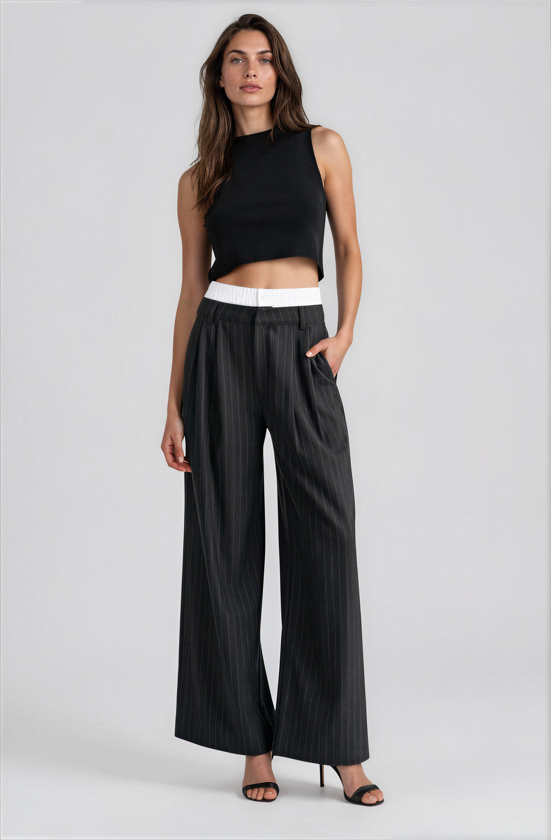 black sleeveless cropped top with intricate back detailing