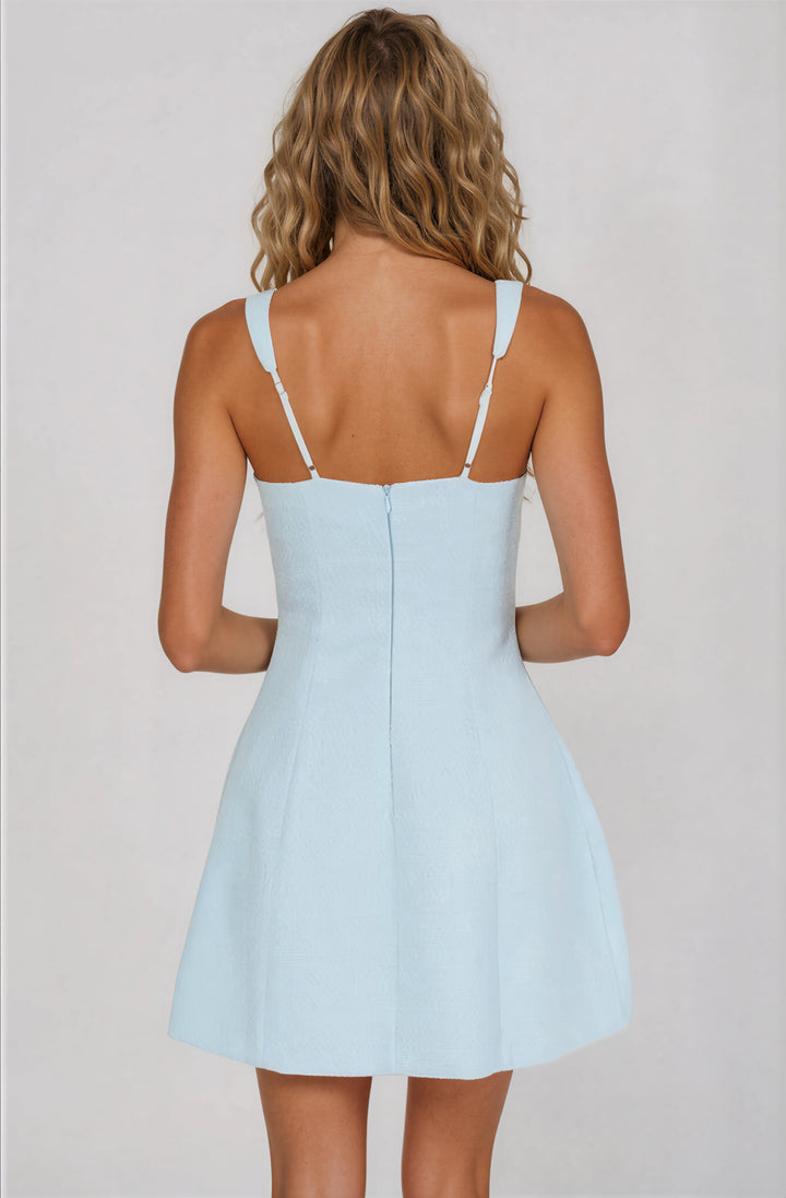 light blue mini dress with front pockets for summer back view