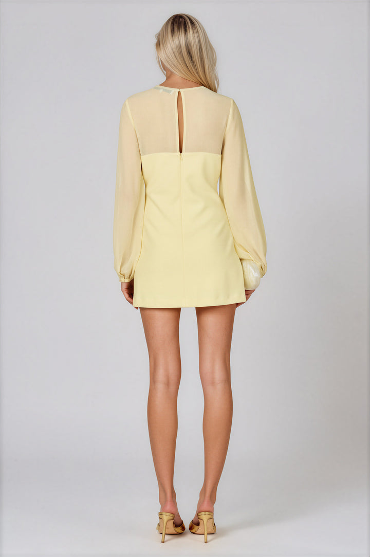 Pale yellow A-line mini dress with sheer gathered yoke and balloon sleeves
