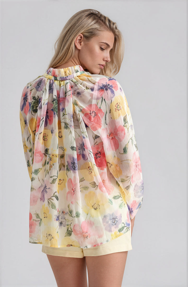 sheer white long sleeve blouse with floral pattern for summer back view
