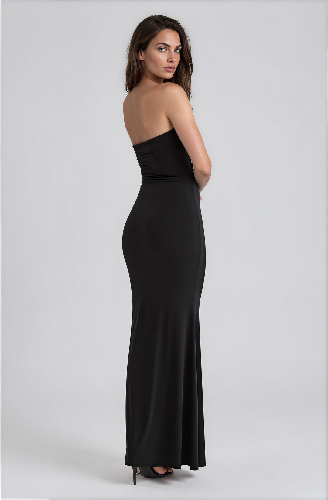 black strapless gown with ruched top and plunge neckline
