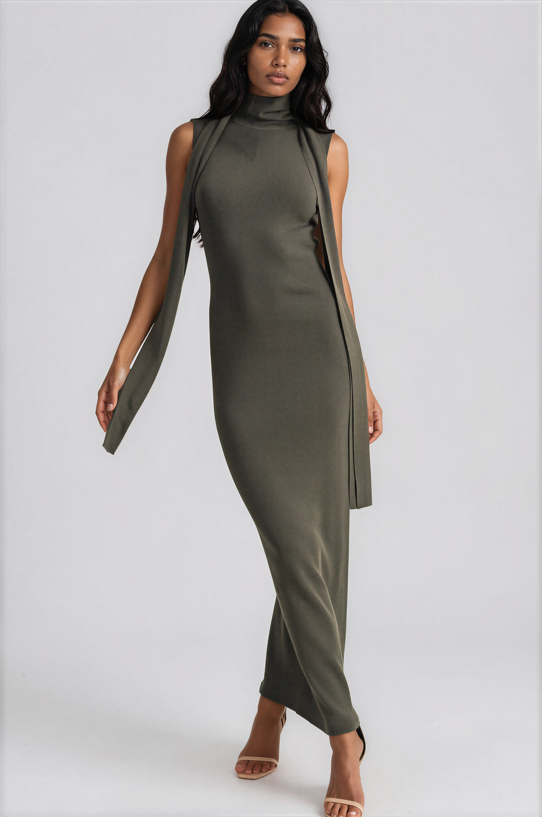 Olive ribbed knit maxi dress with a high turtleneck and attached scarf detail, front view