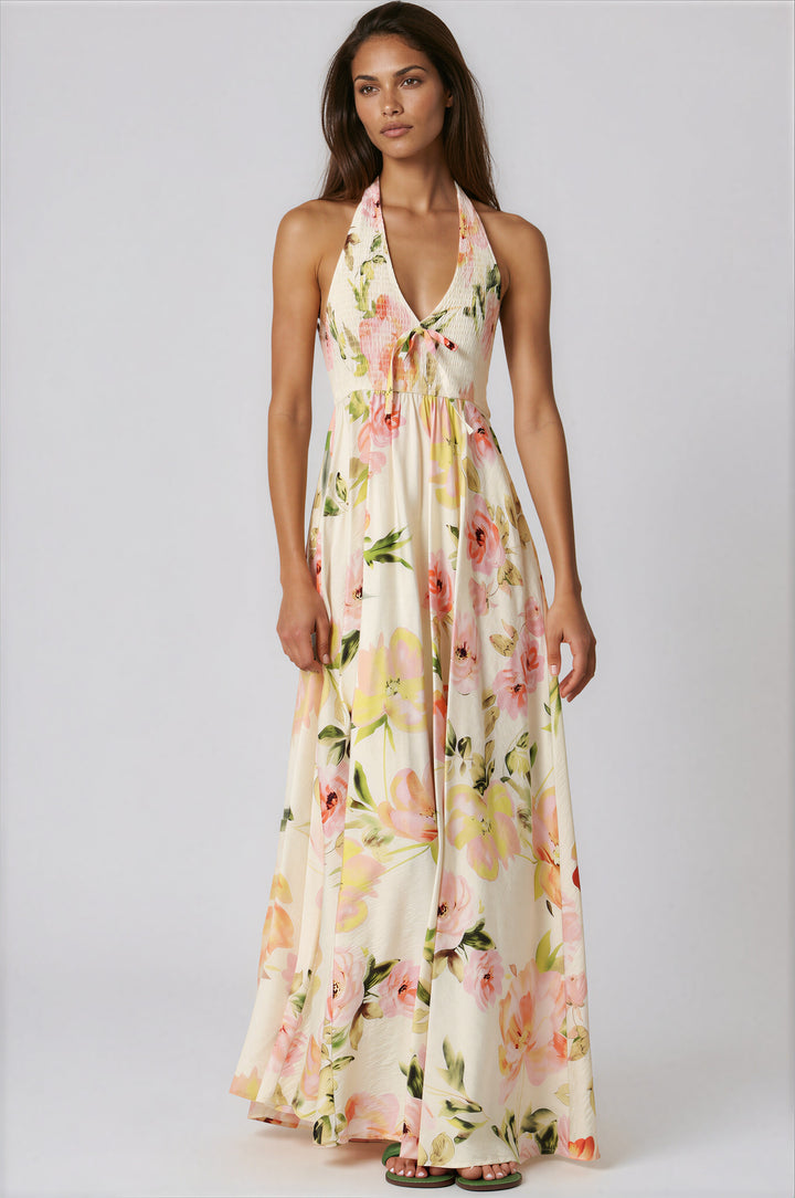 woman wearing smock top ivory floral maxi dress