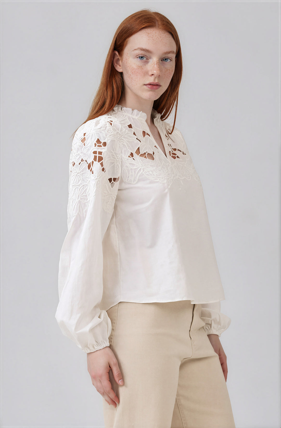 white cotton blouse with cutout detail