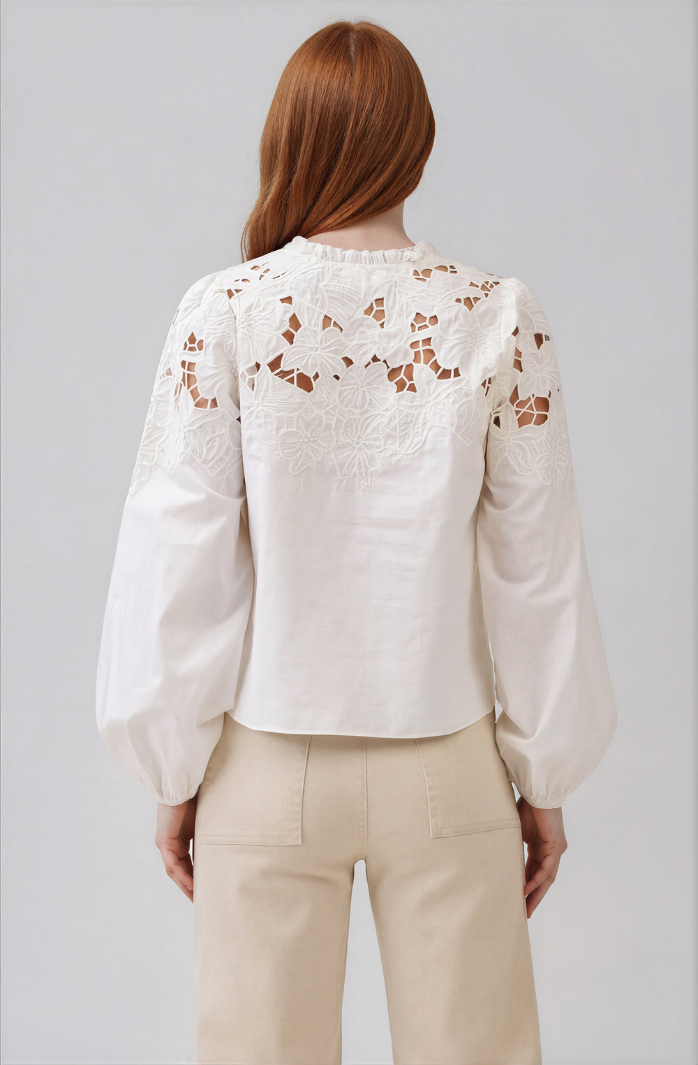 white cotton blouse with cutout detail