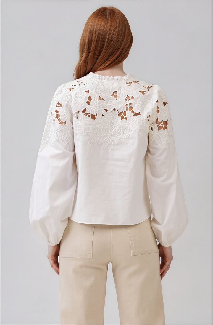 white cotton blouse with cutout detail