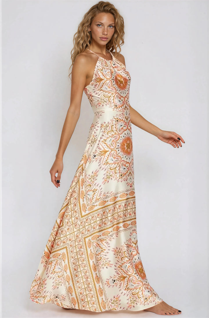 orange and cream satin maxi dress with pattern for summer vacations side view