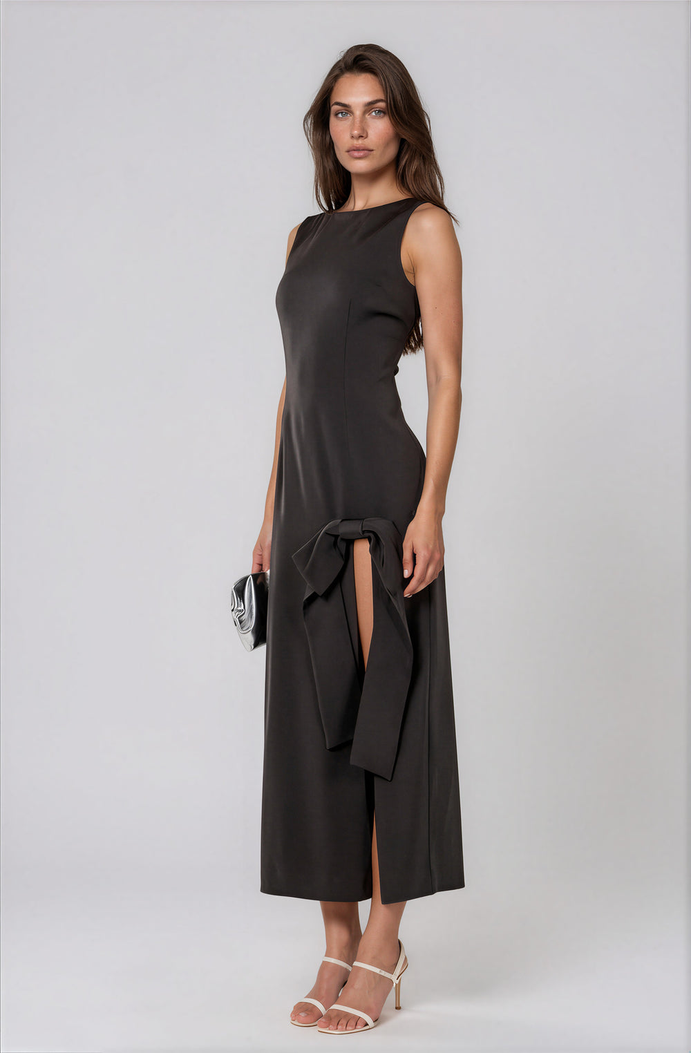 black midi dress with high slit and bow detail for events