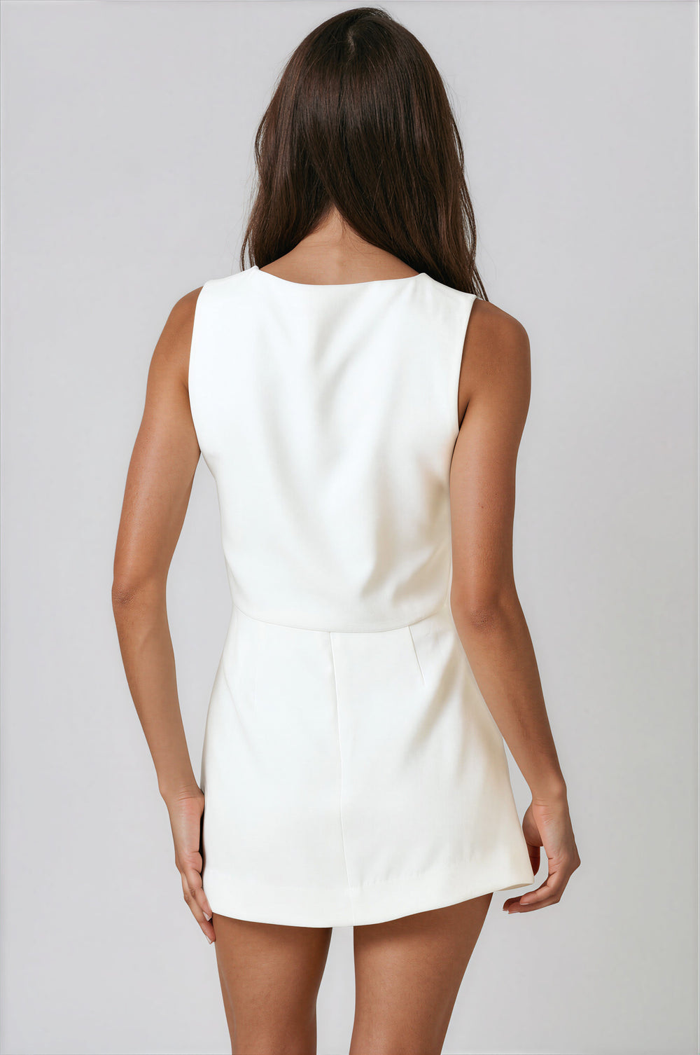 White crepe button-front vest and curved-hem mini skort two-piece set