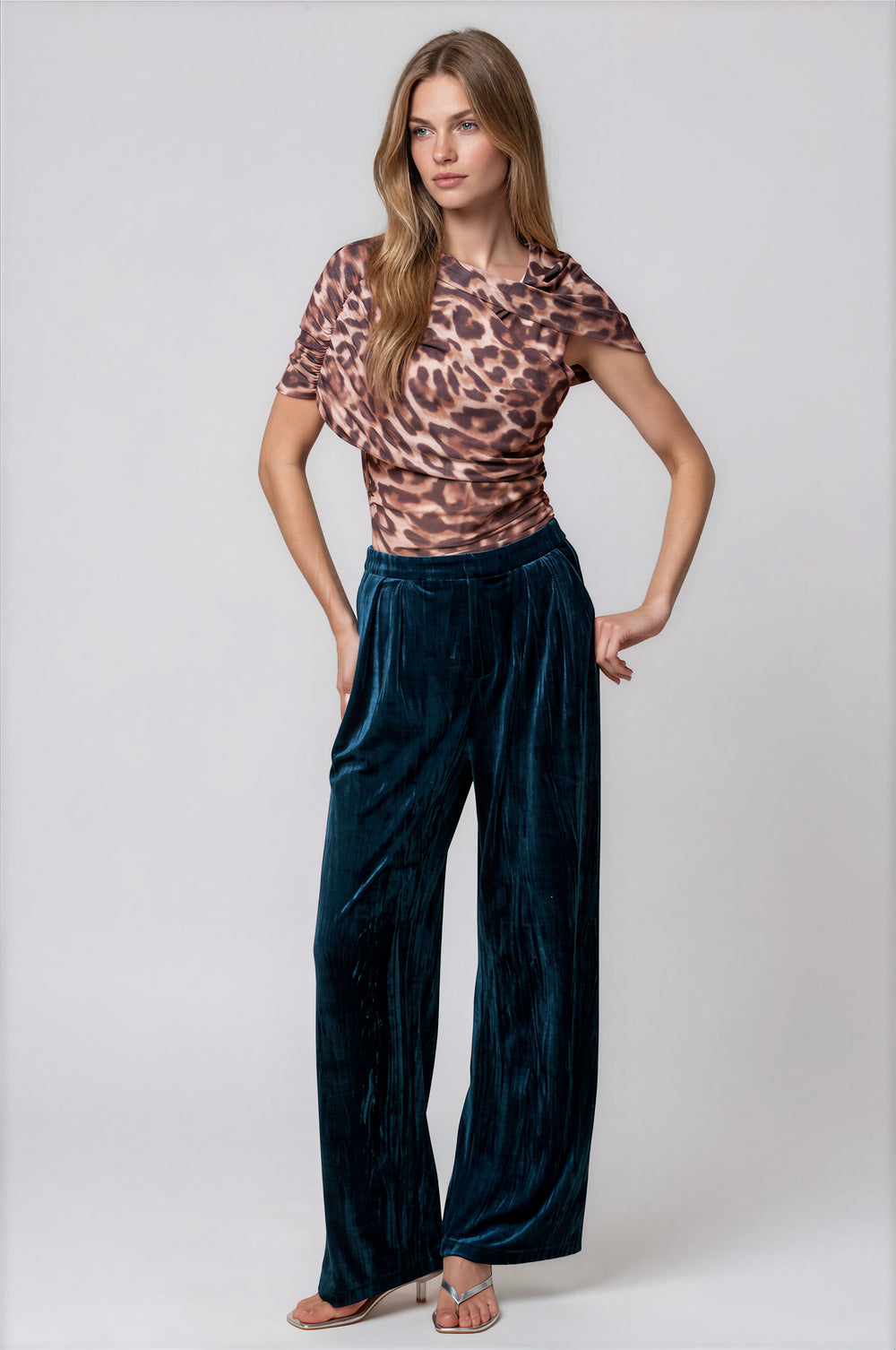 Teal velvet high-waisted wide-leg pants, full-length silhouette