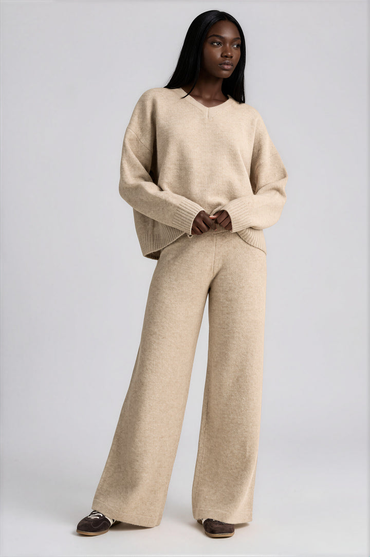 Oatmilk knit set with a V-neck drop-shoulder sweater and wide-leg pants, front view