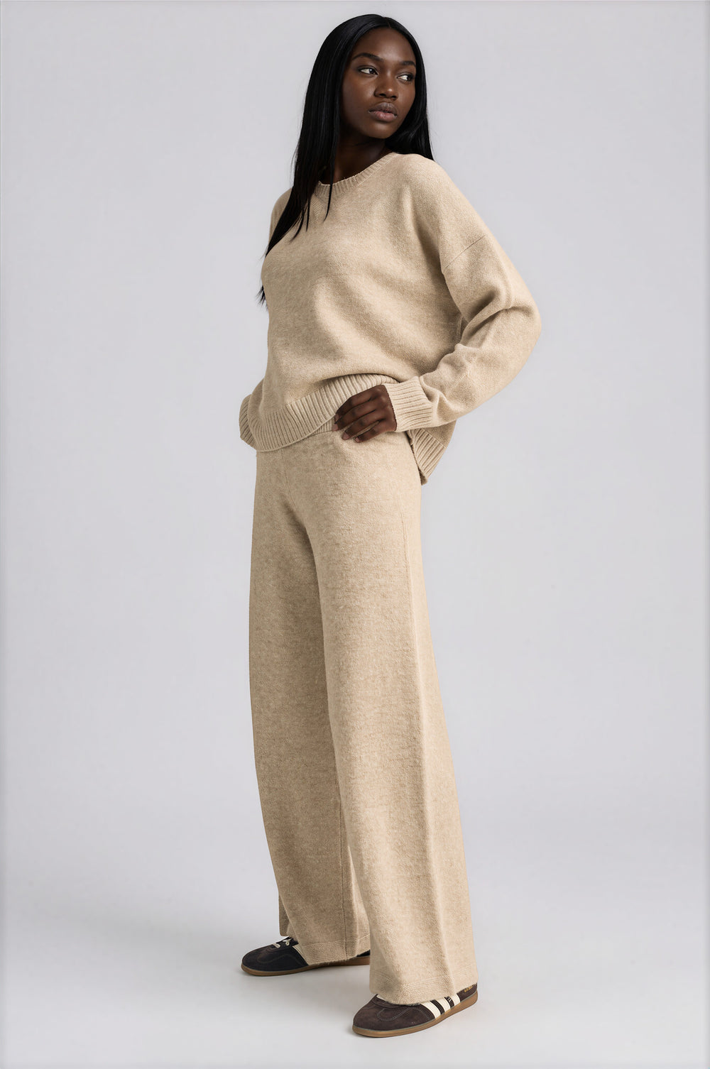 Oatmilk knit V-neck sweater with ribbed hems and matching wide-leg pants