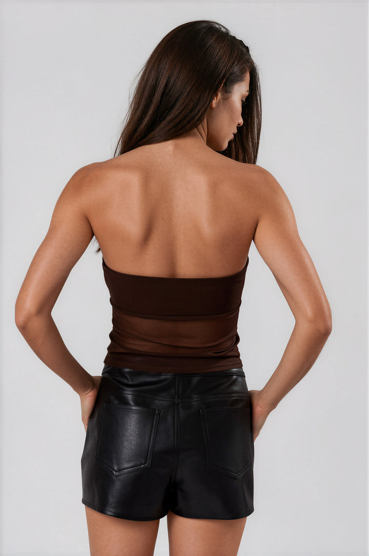 Woman wearing brown mesh strapless tube top with ruched sides