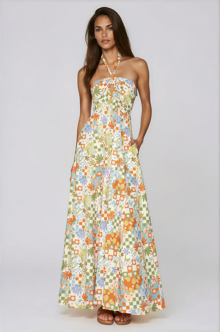 woman wearing floral print halter maxi dress