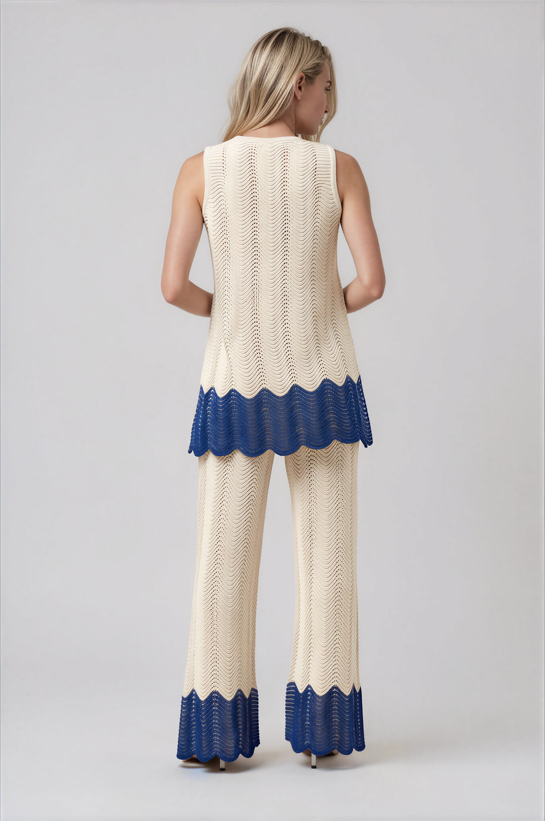 Ivory open-knit sleeveless top and wide-leg pants set