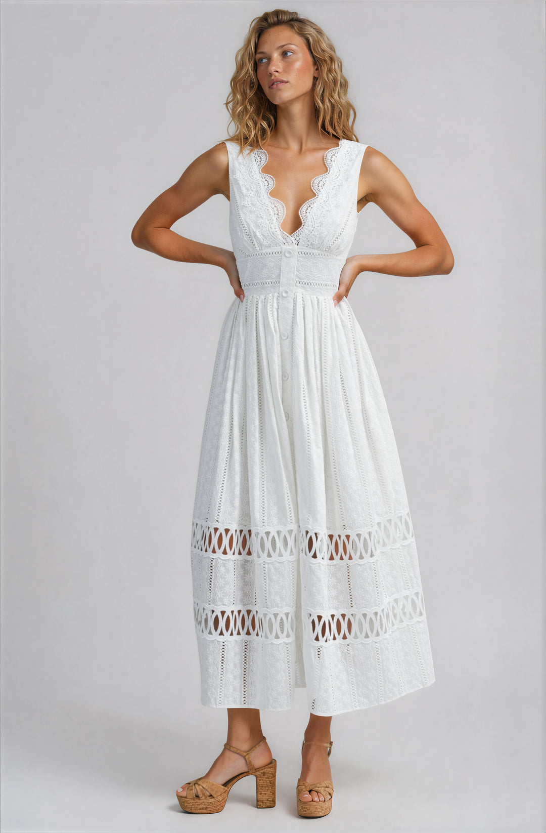 white cotton lace midi dress with v neck and fitted bodice and flowy skirt