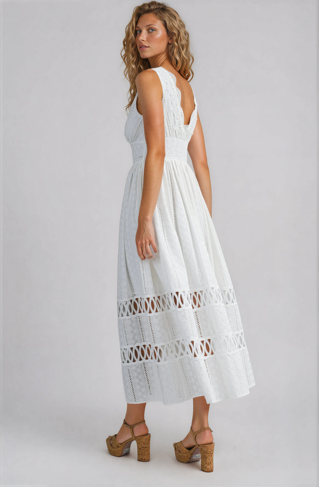 white cotton lace midi dress with v neck and fitted bodice and flowy skirt