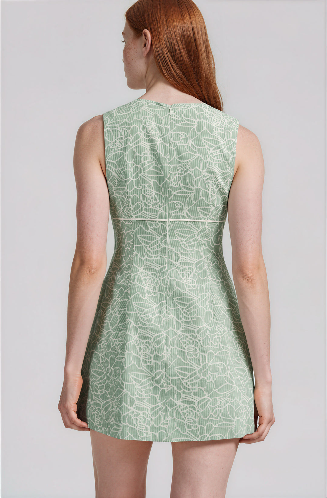 Mint green floral mini dress with bow detail