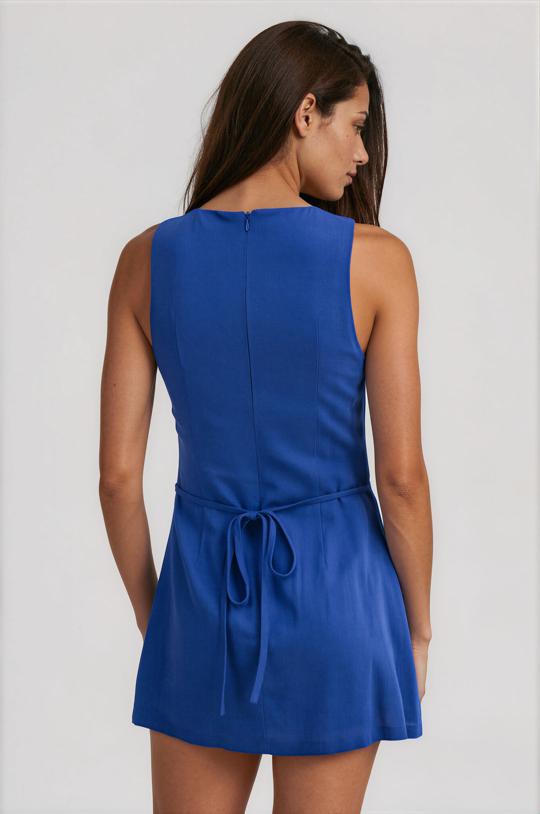 Royal blue sleeveless A-line mini dress with button front placket