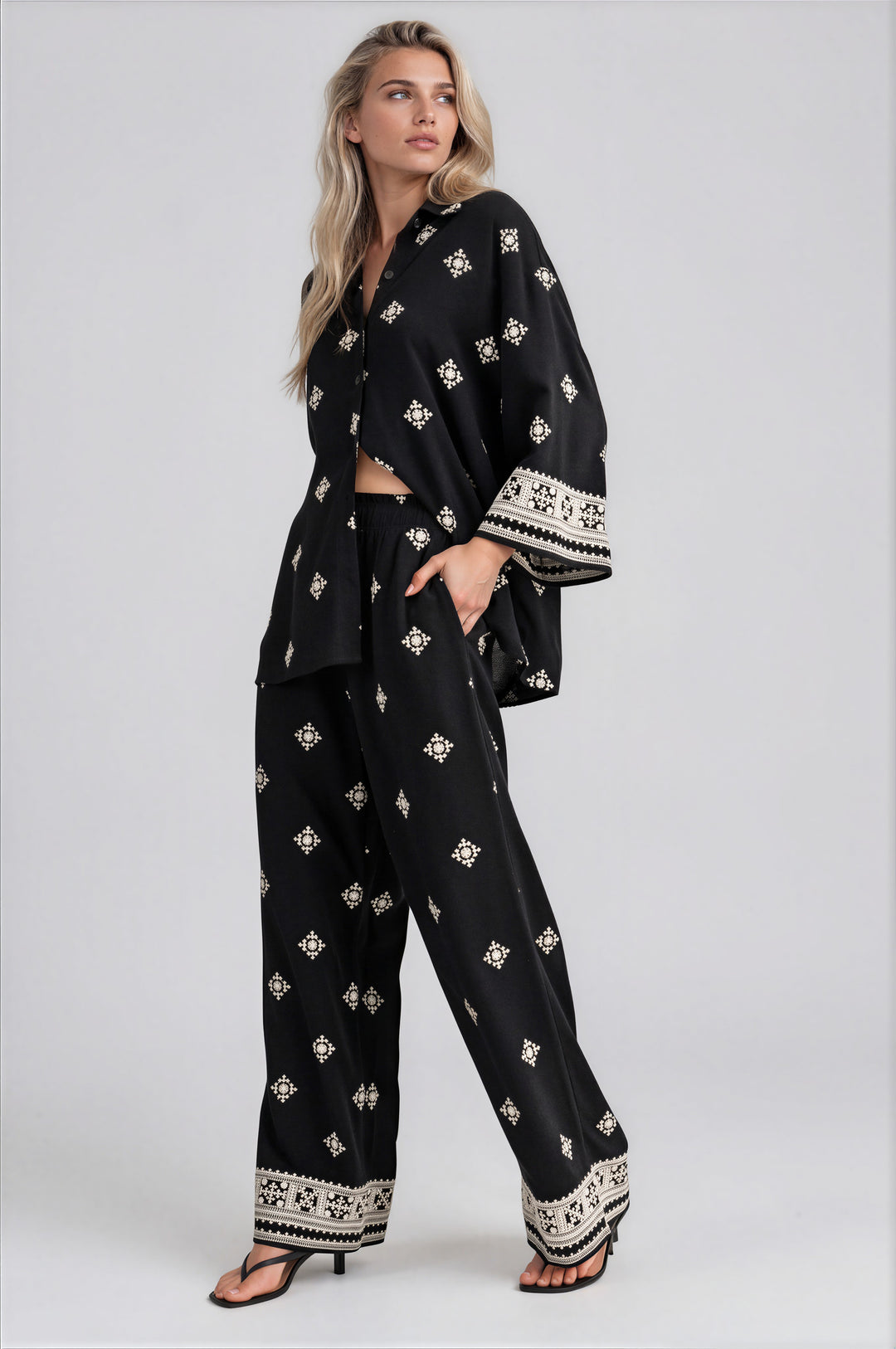 Black embroidered border-print shirt and wide-leg pants two-piece set