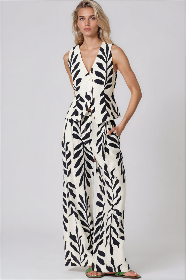 Woman wearing black and white floral matching set