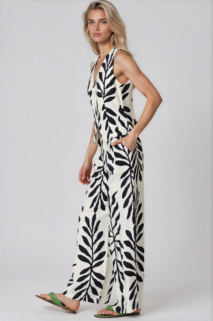 Woman wearing black and white floral matching set