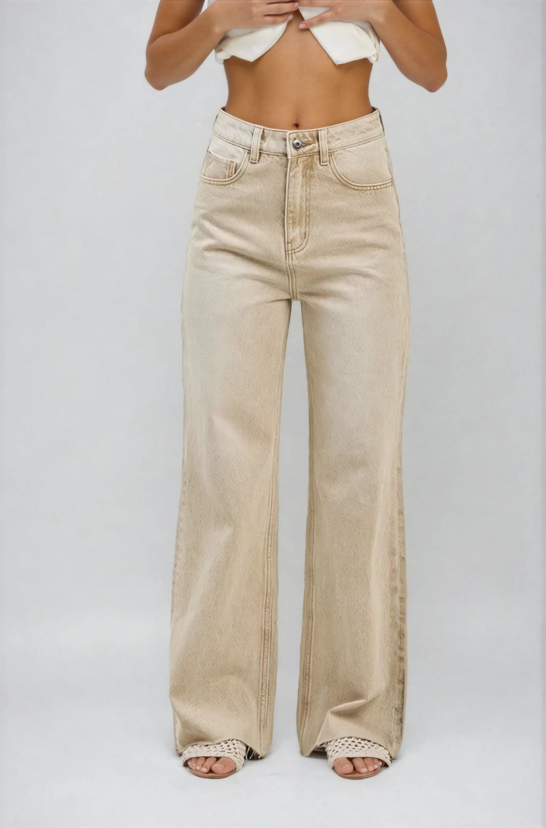 Taupe floral wide leg denim pants on model