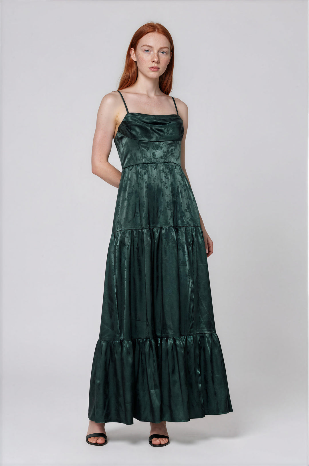Dark green jacquard maxi dress with ruched bodice on model