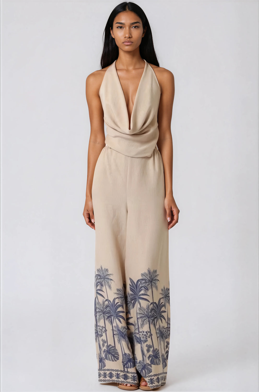 beige halter jumpsuit with palm tree print