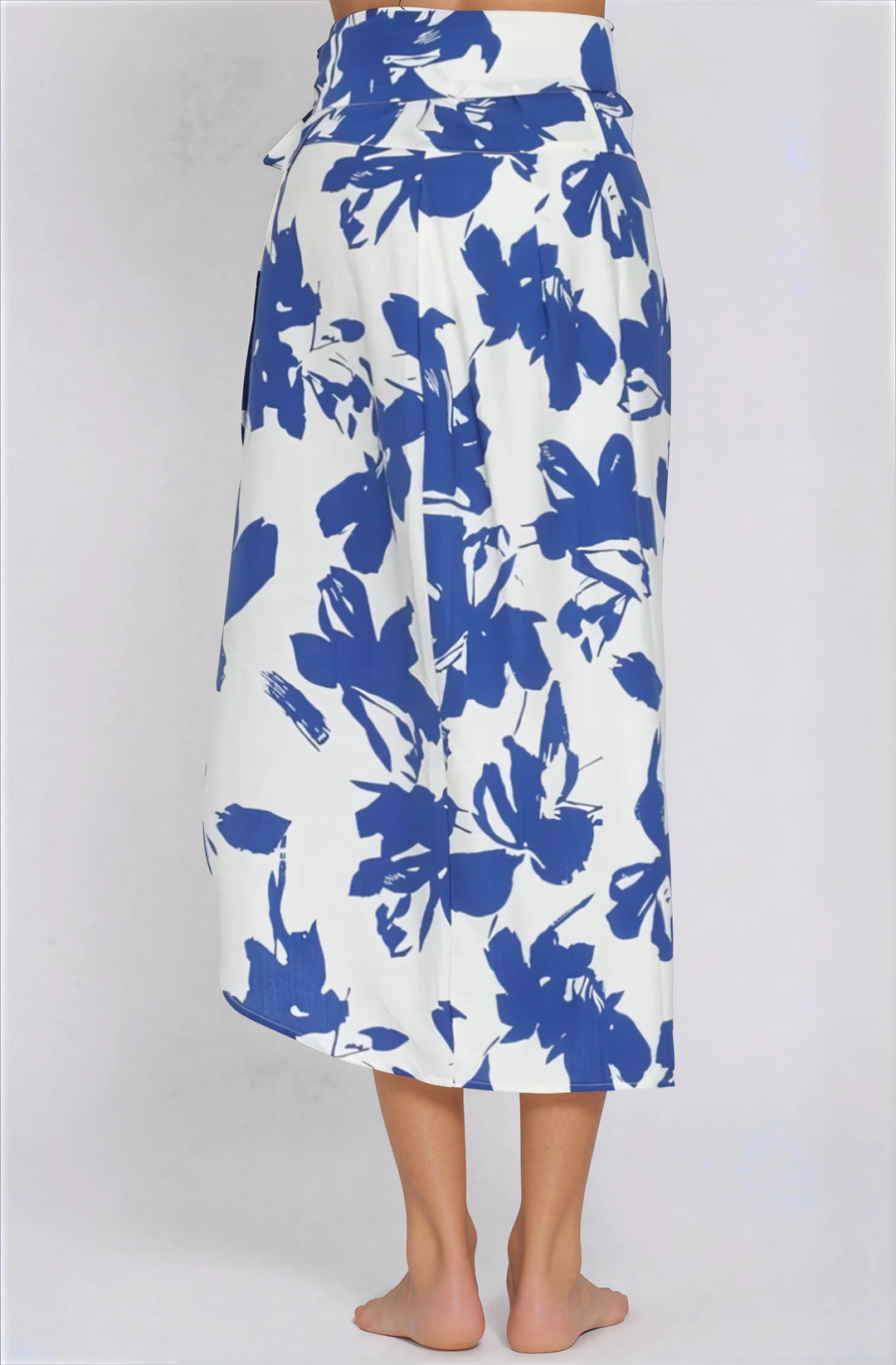 Mandy Blue Floral Wrap Midi Skirt on model, high-waisted with adjustable tie.