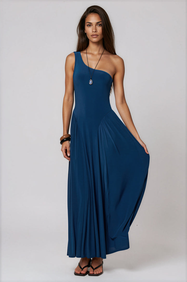 Woman wearing blue one-shoulder fit-and-flare maxi dress with gathered waist