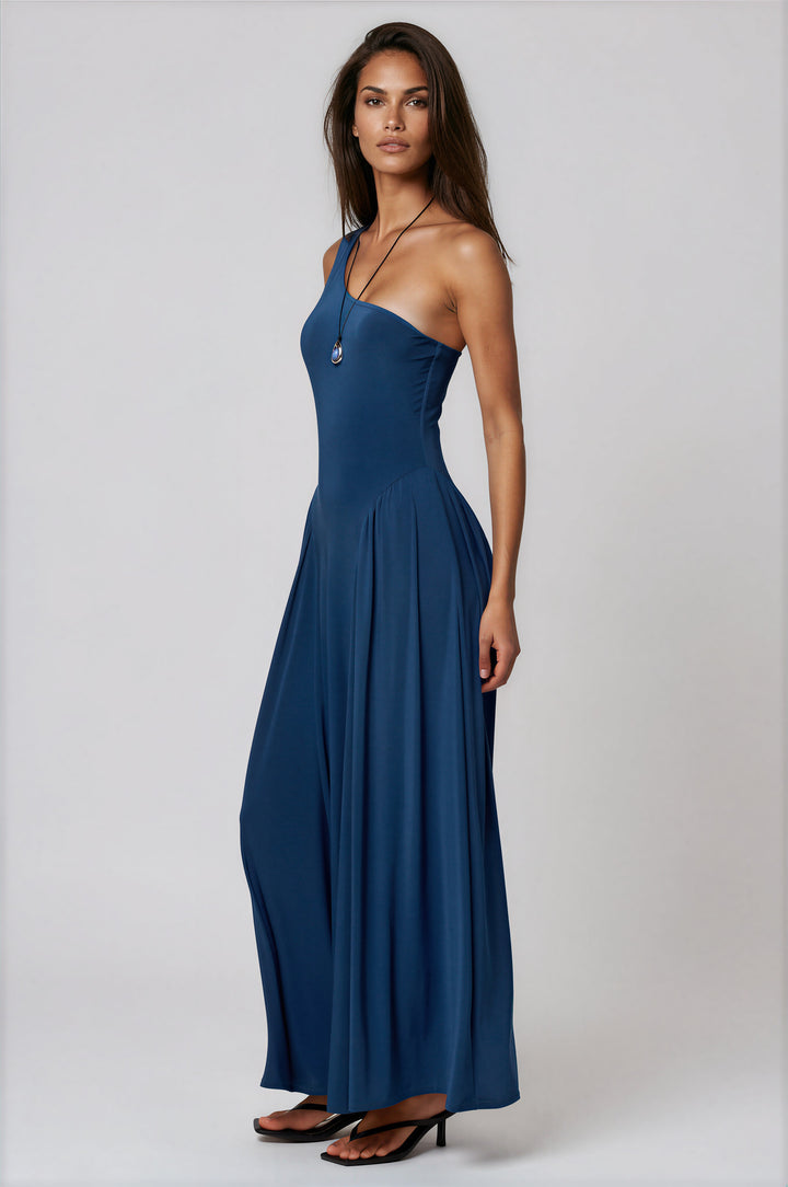 Side view of blue one-shoulder maxi dress with flowing skirt