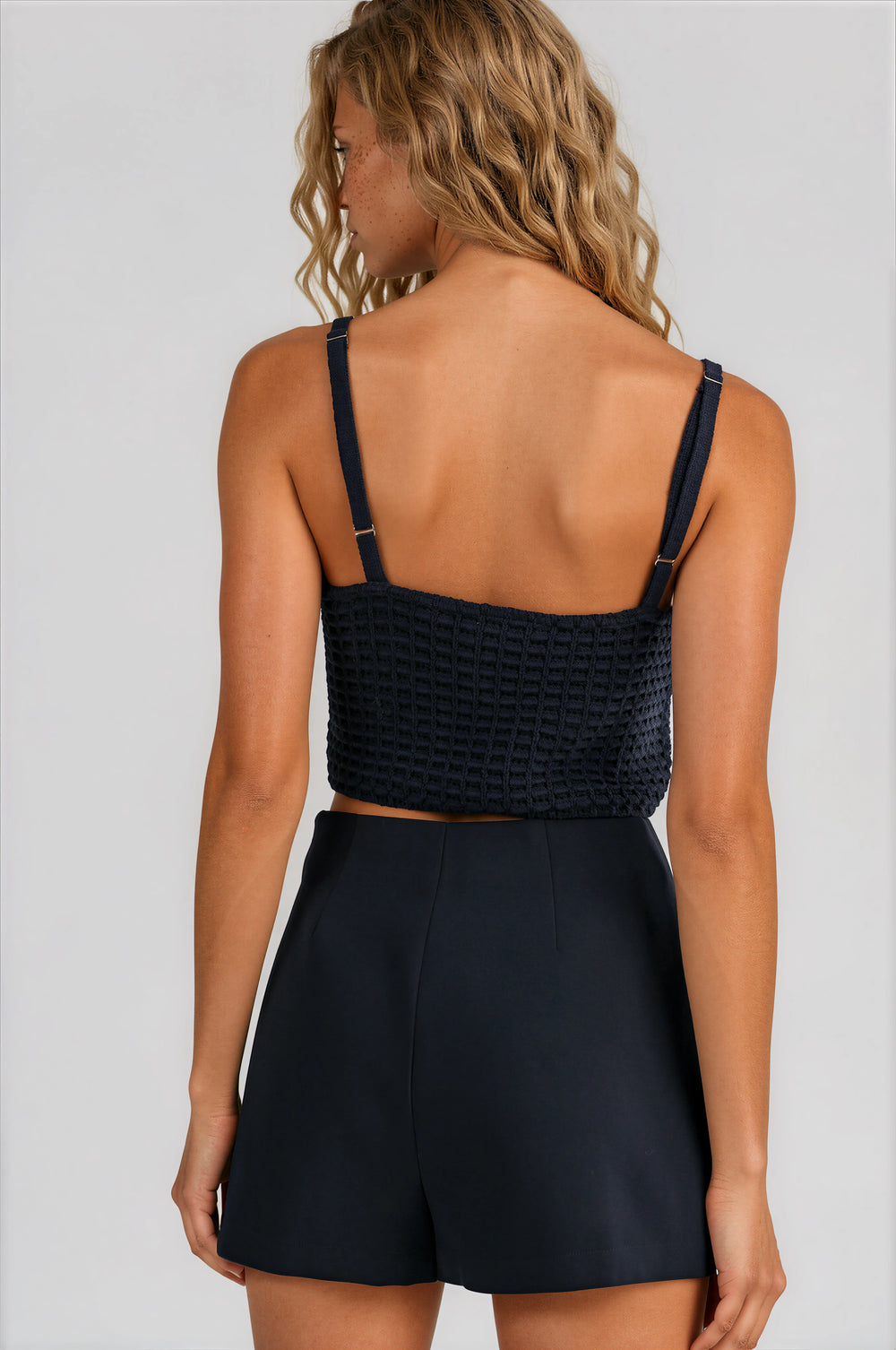 Woman wearing navy blue skort