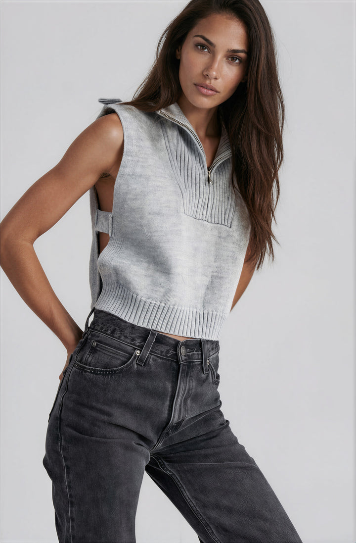 grey sleeveless sweater top with side cutouts and collar