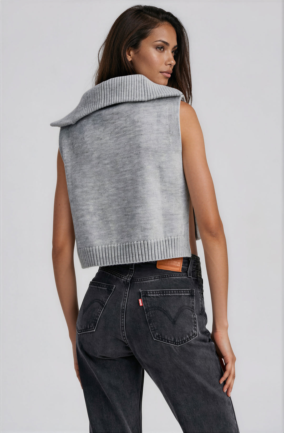 grey sleeveless sweater top with side cutouts and collar